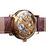 Luxe horloge met gouden kast voor heren - Horloge met leren of mesh bandje Transparant mechanisch skelet