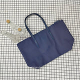 Sac fourre-tout grande capacité pour femme - Sac à main à fermeture éclair en PVC avec revêtement imperméable aux couleurs macarons