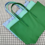 Sac fourre-tout grande capacité pour femme - Sac à main à fermeture éclair en PVC avec revêtement imperméable aux couleurs macarons