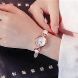 Einfache Quarz-Armbanduhr für Damen – Mini-Zifferblatt aus PU-Leder